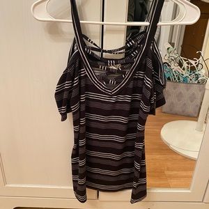 Black and white striped cold shoulder top.